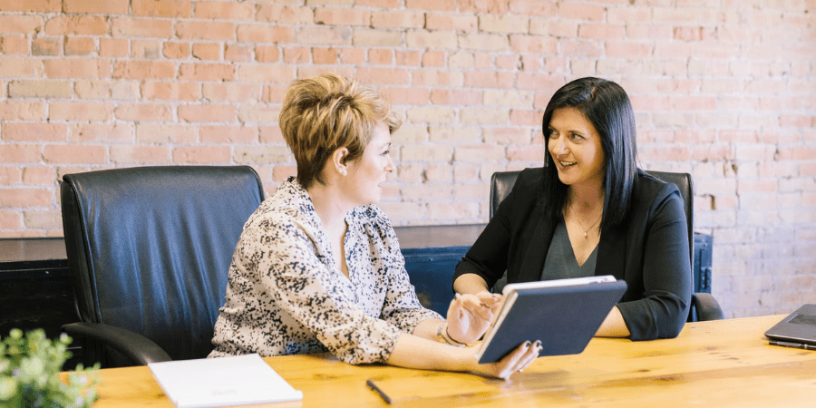 Two Women Having Meeting