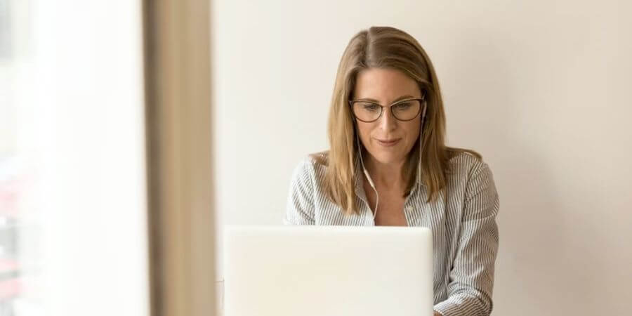 Woman Using Laptop